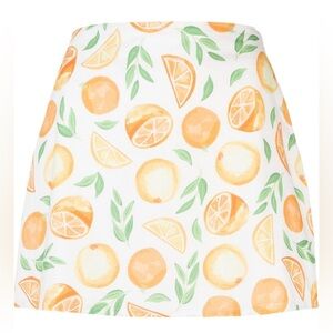 AMBRA MADDALENA Amelia orange print miniskirt